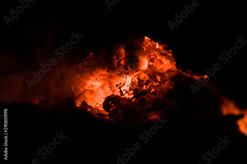 red coals in a dark fire