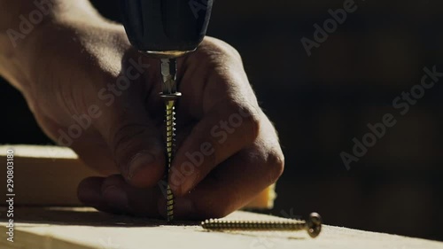 Drilling into wood with screw twisted into place 100 fps HD