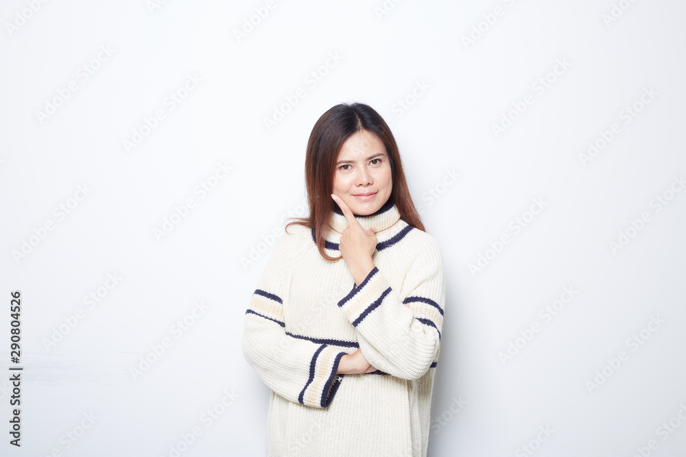 Happy beautiful asian woman in Christmas wearing in sweater studio shot isolated on gray background.banner with copy space Happy beautiful asian woman in Christmas wearing in sweater studio shot isolated on gray background.banner with copy space