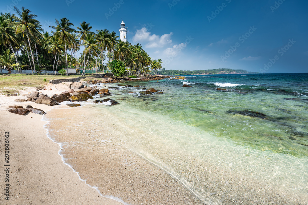 Lighthouse and beautiful beach landscape in Sri Lanka