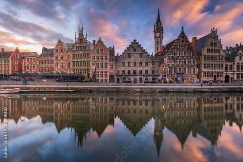 Facade of historical building with reflection with vibrant sky at Gent, Belgium