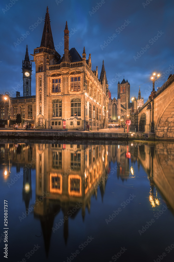 Historical buildings with reflection during twilight at Gent, Belgium Historical buildings with reflection during twilight at Gent, Belgium
