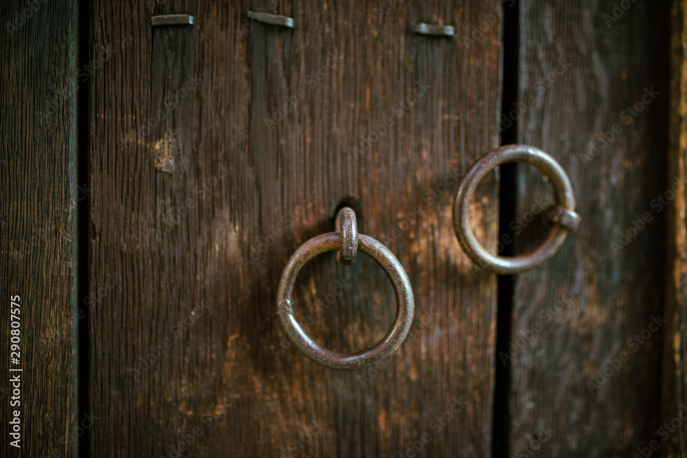 old wooden door with beautiful metal elements old wooden door with beautiful metal elements