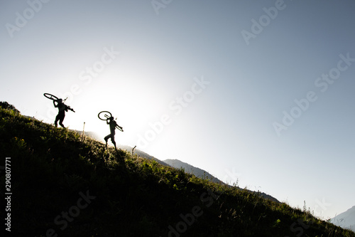 man on top of mountain