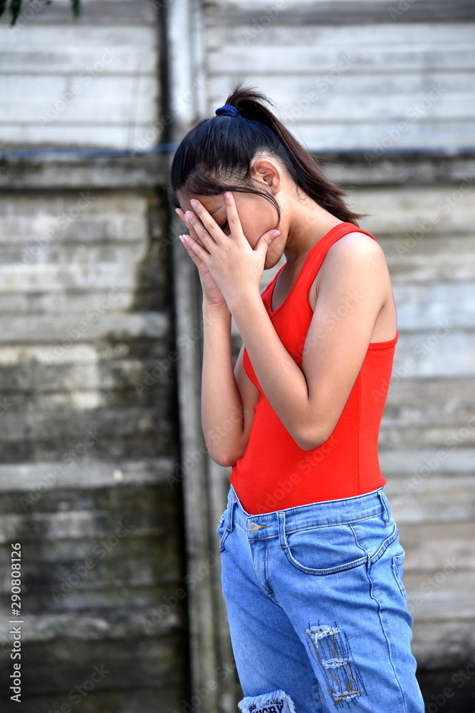 Fototapeta premium An An Unhappy Diverse Female