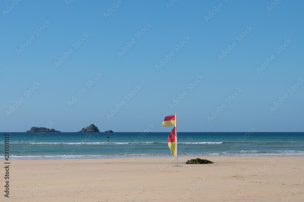 safe swimming flags on a Cornish beach safe swimming flags on a Cornish beach