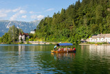 Pleasure boats with tourists on Lake Bled in Slovenia.