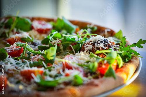 tasty italian pizza with fresh ingredients & vegetables