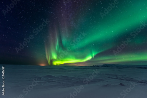 Northern lights aurora borealis in the winter  © surangaw