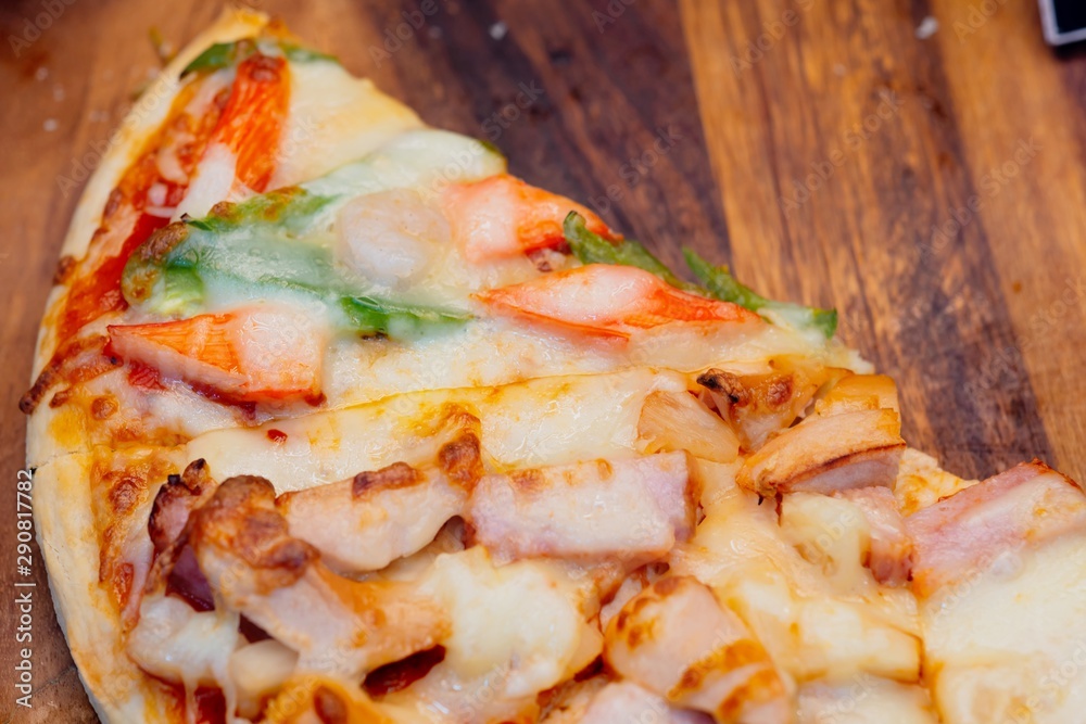 italiana food. Pizza Serve on wooden plate italiana food. Pizza Serve on wooden plate
