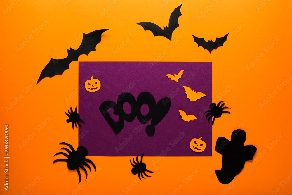 Halloween holiday concept top view. Pumpkins, ghost, spiders, bats on the orange background. Halloween holiday concept top view. Pumpkins, ghost, spiders, bats on the orange background.
