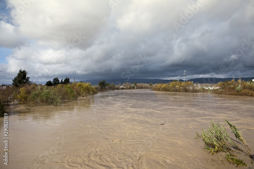 Spain guadalquivir River to the point of overflow caused by heavy rains, Andajar, Jaen province, Andalusia, Spain photo