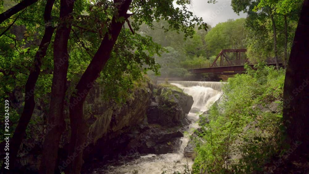 Waterfalls Under the Yantic Falls Historical Railroad Bridge Landmark in Connecticut, Wide-angle Establishing Shot