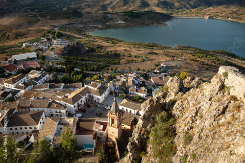 a view over Zahara de la Sierra town and El Gastor dam, province of Cadiz, Andalusia, Spain photo