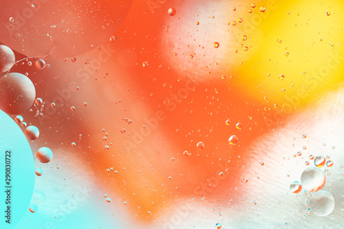 Abstract background, colorful gradient colors. Oil drops in water.