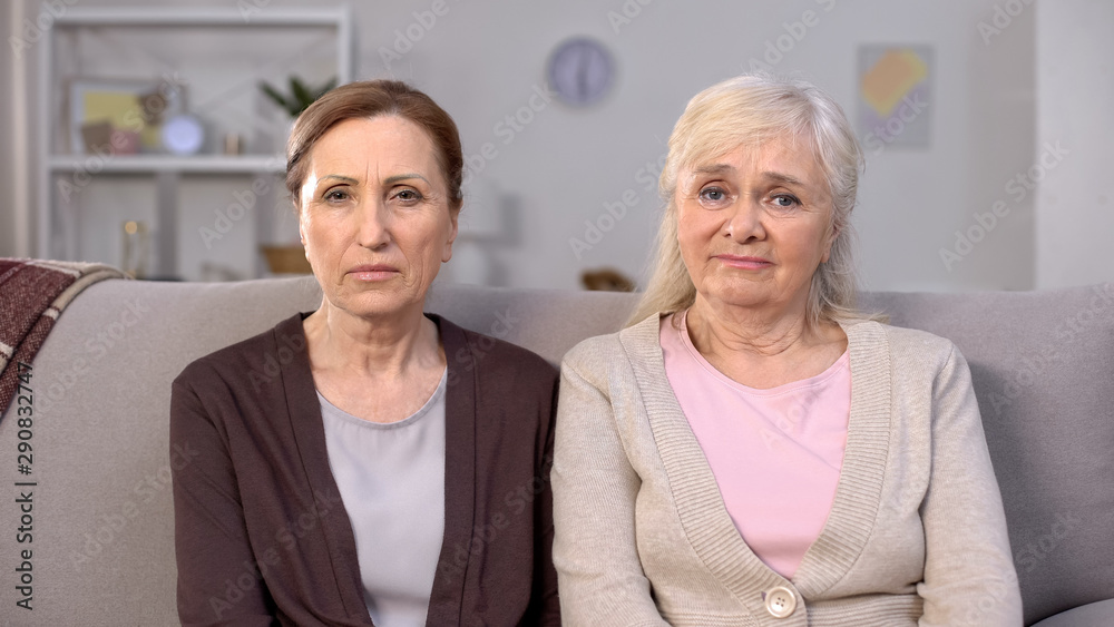 Upset senior women looking camera, social insecurity, pension reform, crisis