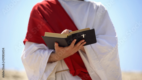 Εκτύπωση καμβά Prophet in robe reading bible, theology and interpretation of Christianity