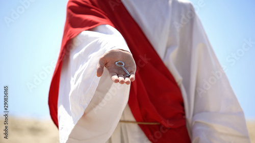Photography Jesus hand holding key, disclosure of heart and hidden thought to God, pure soul