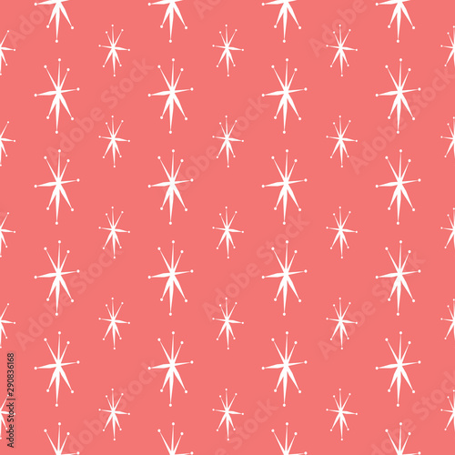 Mid Century star seamless pattern in coral pink and white. Retro styled mod look  that works well for Christmas,  winter decor, textiles, fashion and paper items. Vector.