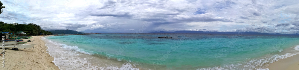 White Sand Beach and the turquoise ocean in Moalboal, Cebu, Philippines