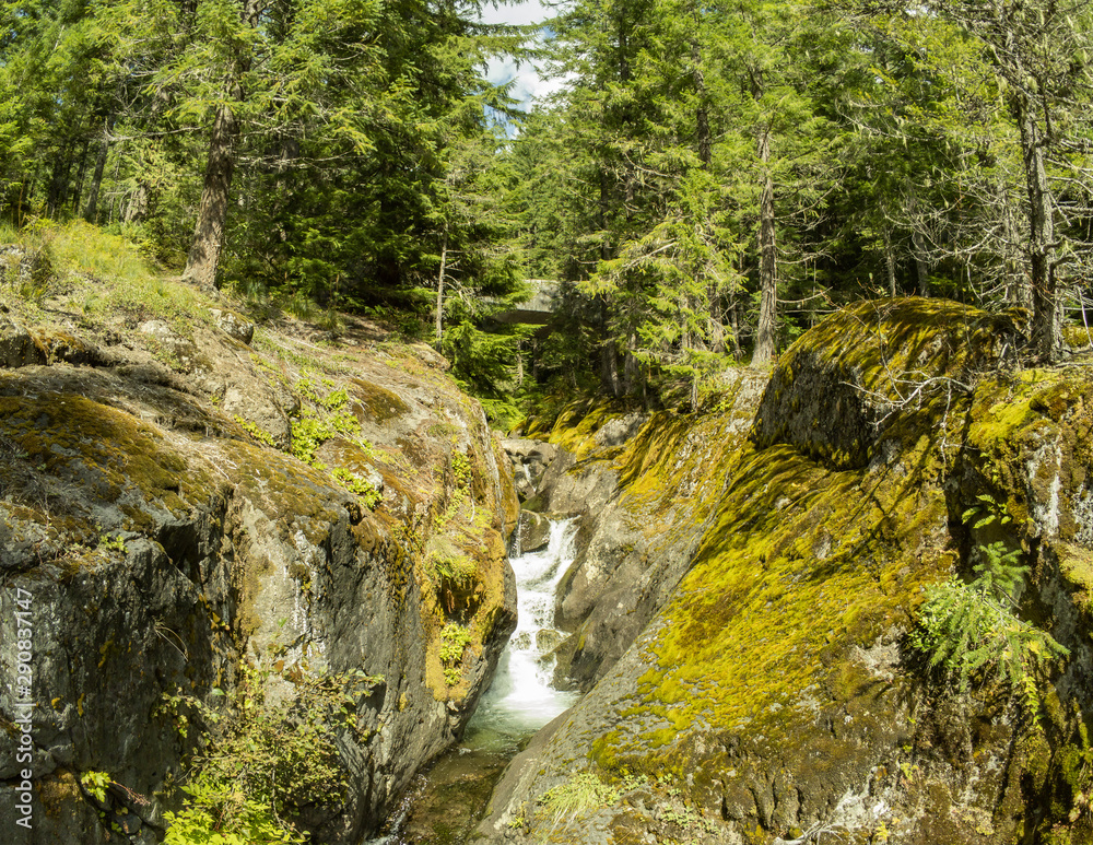 Marvelous aerial photography of Cougar Falls in the Mount Rainier National Forest Area of Washington State Marvelous aerial photography of Cougar Falls in the Mount Rainier National Forest Area of Washington State
