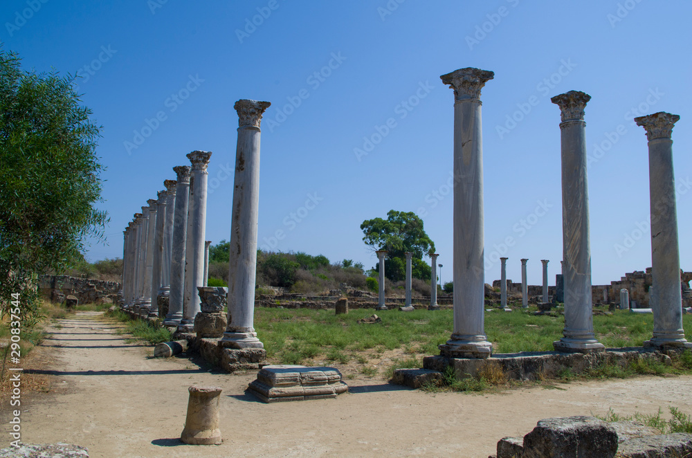 The corinthian columns in ancient gymnasium in antique town Salamis, sunny day and blue sky, Famagusta, Nothern Cyprus