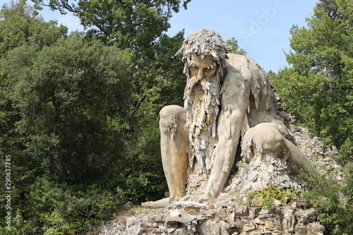 The Appennine Colossus was sculpted by Giambologna in the 16th century, it is located in the renaissance park of Villa Demidoff near Florence in Tuscany, Italy. photo