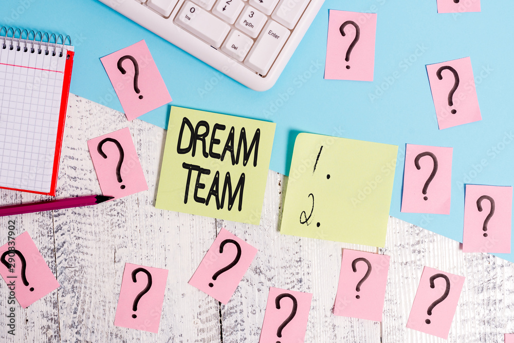 Conceptual hand writing showing Dream Team. Concept meaning Prefered unit or group that make the best out of a demonstrating Writing tools and scribbled paper on top of the wooden table Conceptual hand writing showing Dream Team. Concept meaning Prefered unit or group that make the best out of a demonstrating Writing tools and scribbled paper on top of the wooden table