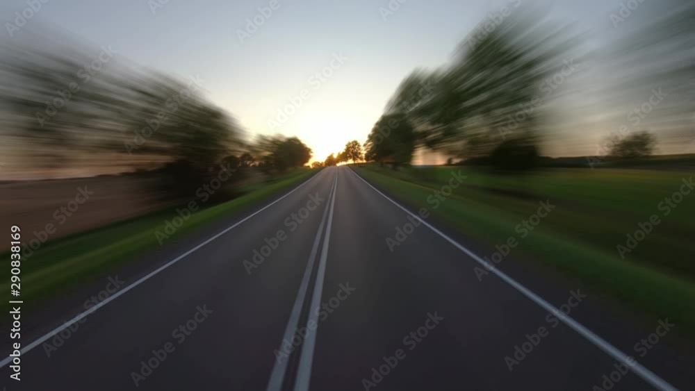 On a rural road to sunset, time-lapse On a rural road to sunset, time-lapse