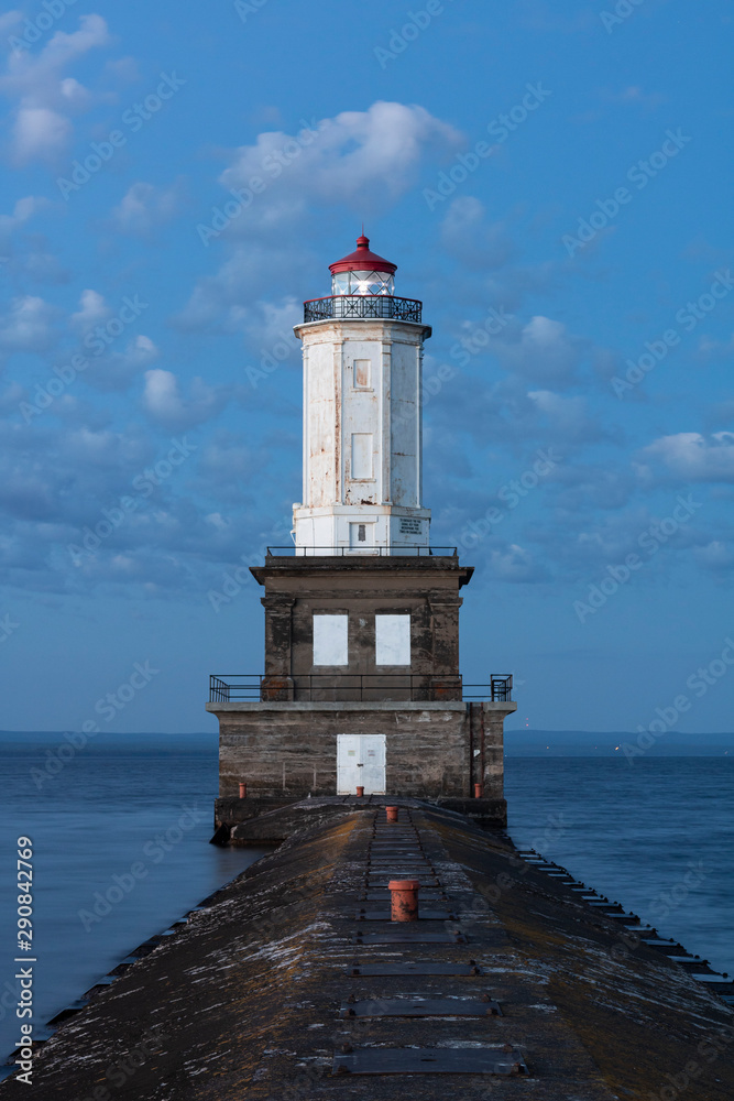lighthouse with morning clouds