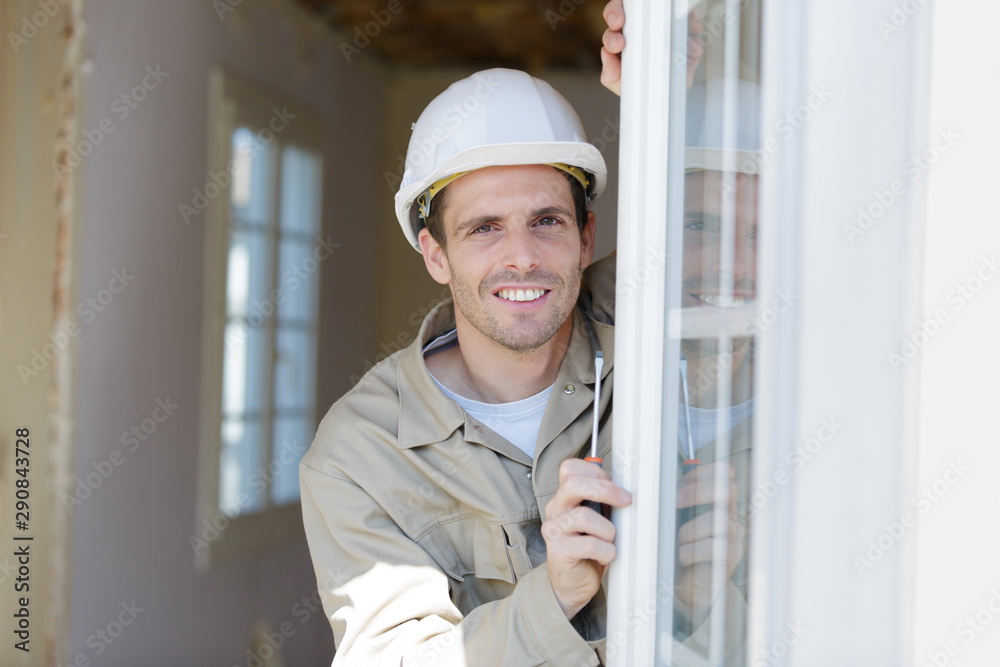 man in hard hat looking at the camera man in hard hat looking at the camera