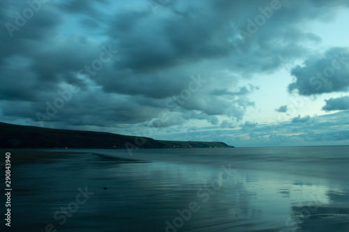 Low tide sea with clouds