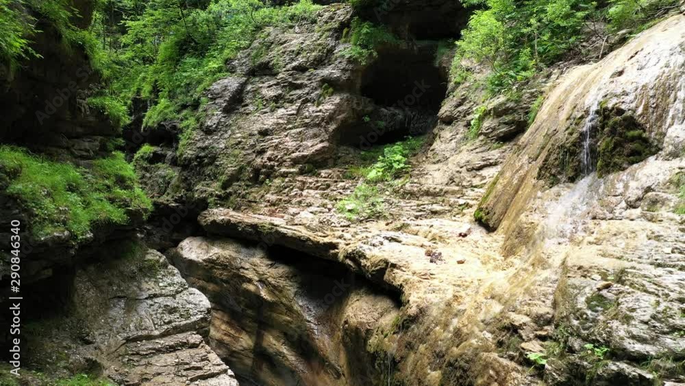 Spring in a mountain gorge, in the middle of a beautiful green forest Spring in a mountain gorge, in the middle of a beautiful green forest