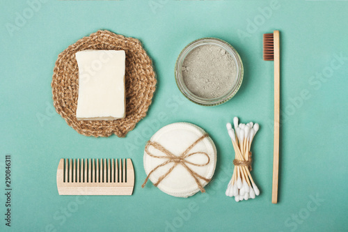 Set of eco-friendly plastic-free body care items on the mint background. Flat lay. Zero waste concept, plastic-free, organic, eco-friendly shopping