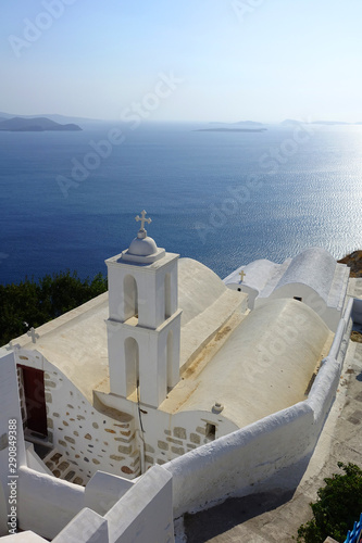 Picturesque small chapels below iconic castle of Astypalaia island with views to the Aegean deep blue sea