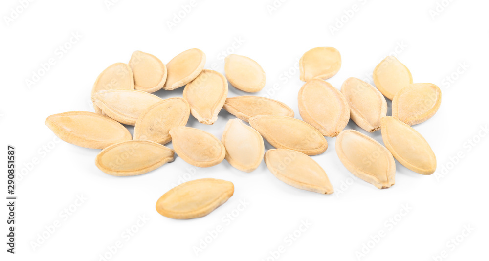 Pile of raw pumpkin seeds on white background