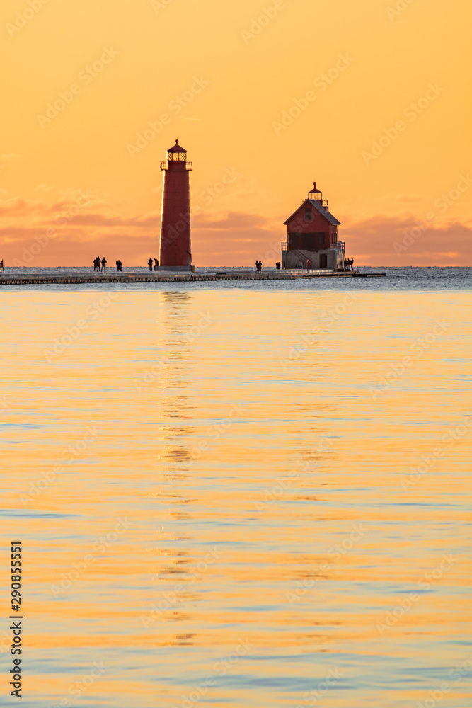 lighthouse reflection at sunset