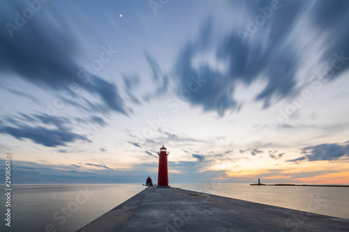 moving clouds over lighthouses