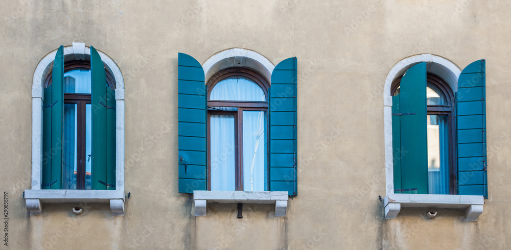 Old vintage windows in Venice, Italy.