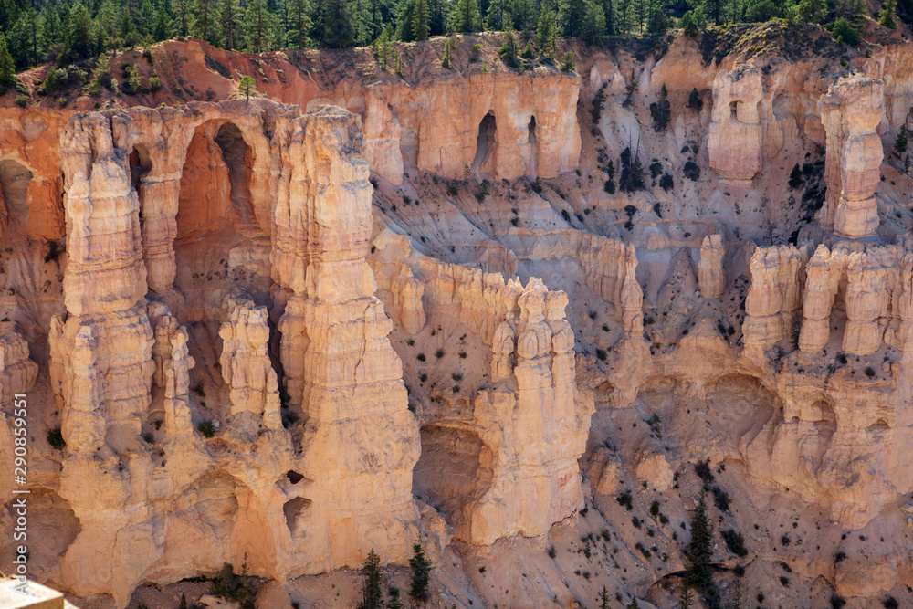 The spectacle of thousands of glowing orange earthen spires concentrated in the valley below the rim of Bryce Canyon National Park is an amazing site The spectacle of thousands of glowing orange earthen spires concentrated in the valley below the rim of Bryce Canyon National Park is an amazing site
