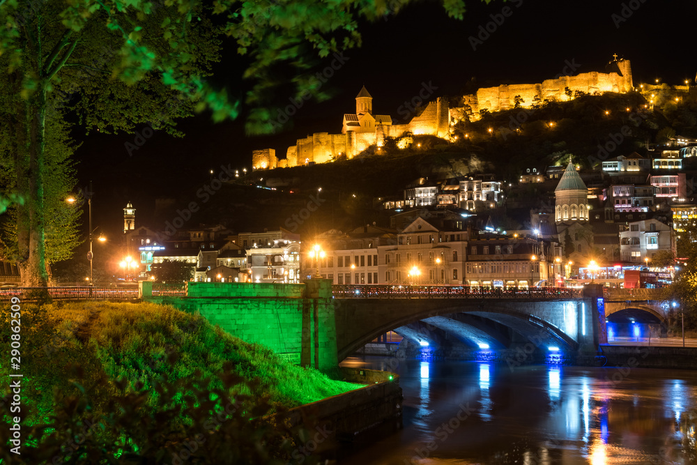 Night view of Metekhi bridge and Narikala fortress in Tbilisi