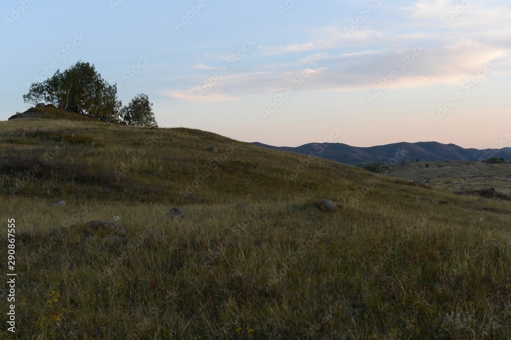 An evening in the Altai mountains near the Charysh River. Western Siberia An evening in the Altai mountains near the Charysh River. Western Siberia