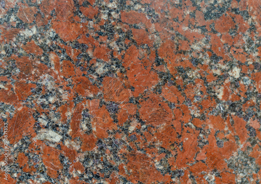 The wall is made of red-flecked marble. The wall is made of red-flecked marble.