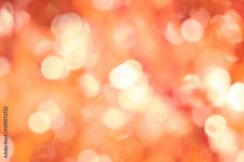 Abstract orange illumination textured background with bokeh defocused lights for Halloween or Christmas festival, copy space