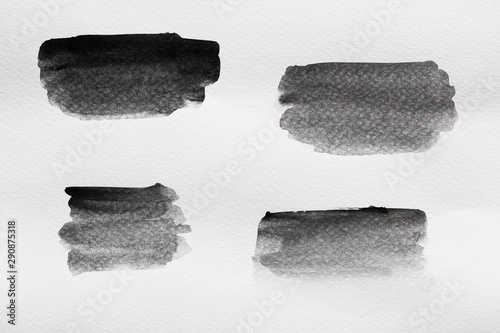 Abstract Hand painted Watercolor black brush background on paper. Watercolor texture for creative wallpaper or design art work. Pastel colors