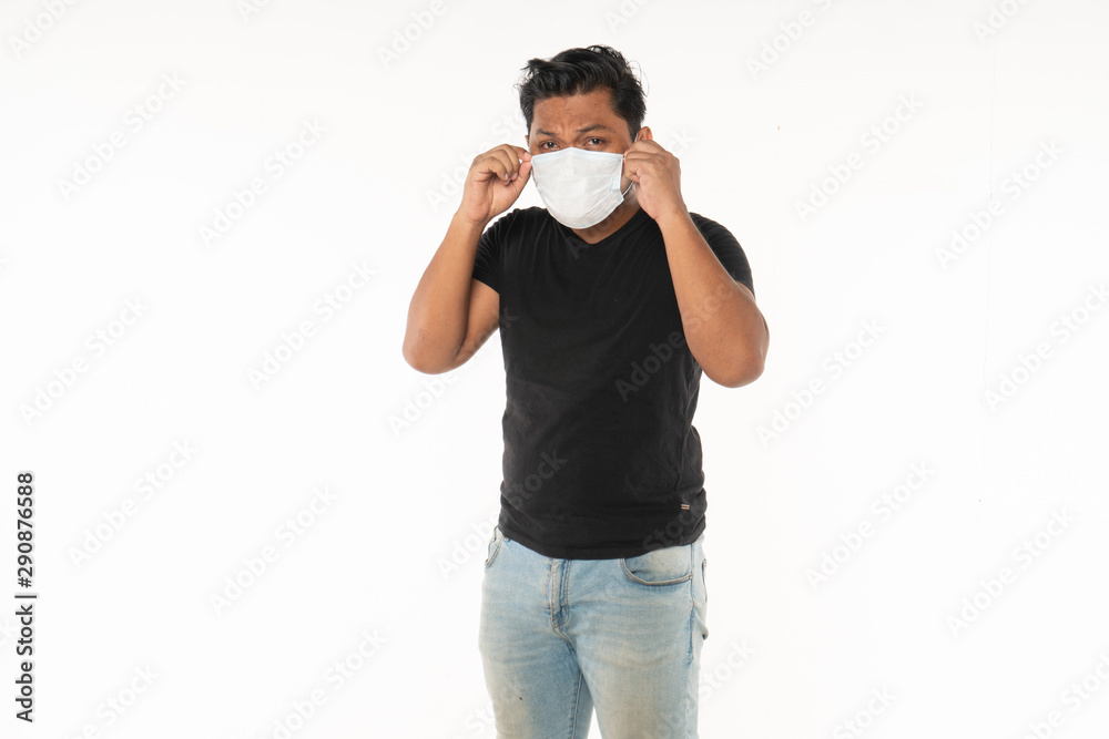 Fototapeta premium Asian man wearing face masks due to the haze situation isolated on white