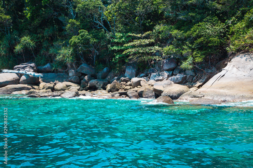 Similan Islands, Andaman Sea, Thailand, National park, beautiful blue sea. White boats with tourists.
