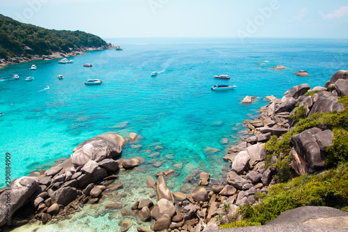 Similan Islands, Andaman Sea, Thailand, March 18, 2018: National park, beautiful blue sea. White boats with tourists.