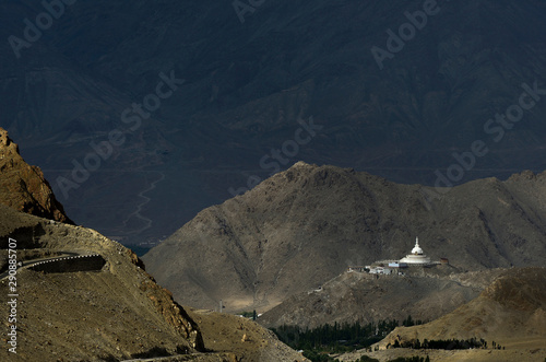 Shanti Stupa long shot, Buddhist white-domed stupa or chorten on a hilltop in Chanspa, Leh district, Ladakh, India photo