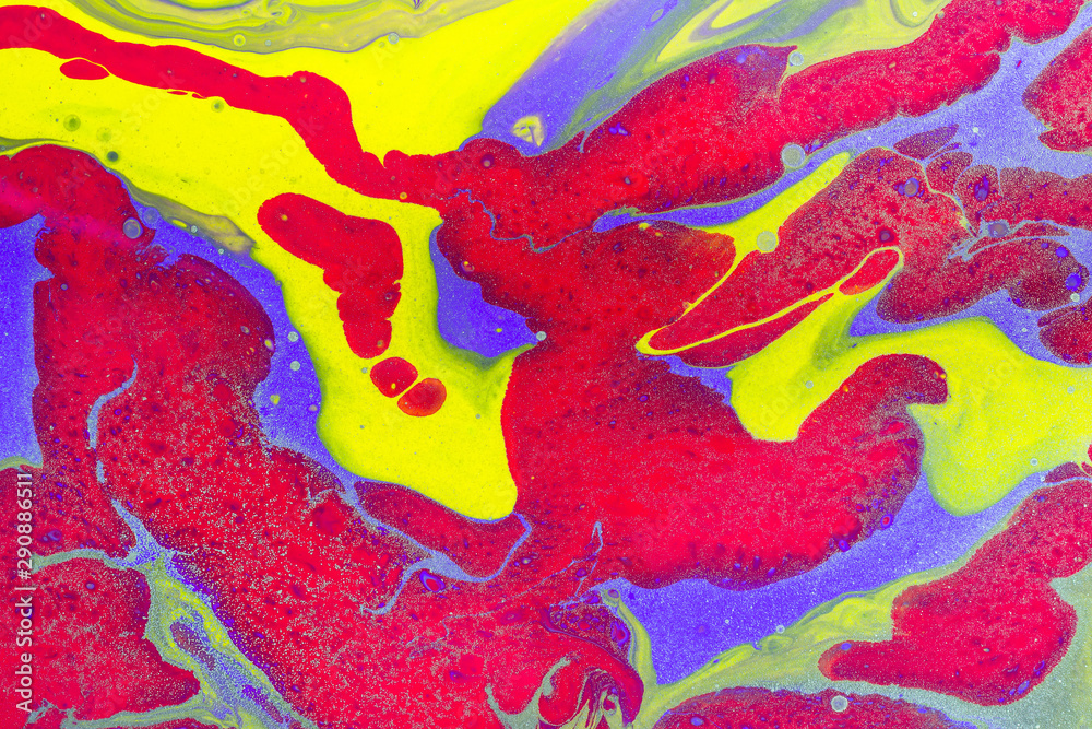 Fluid Art. Red, violet and yellow color spots mixing with gold inclusions. Abstract wavy background or texture
